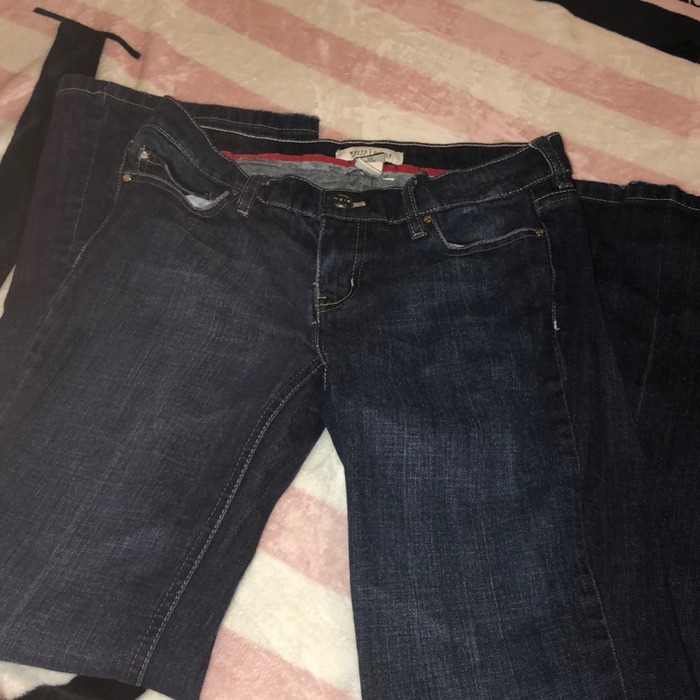 boot leg jeans with roses on the back